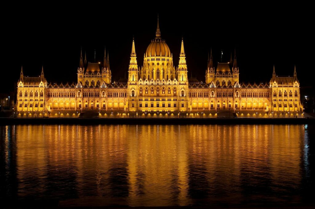 Brown Lighted Dome Near Body of Water